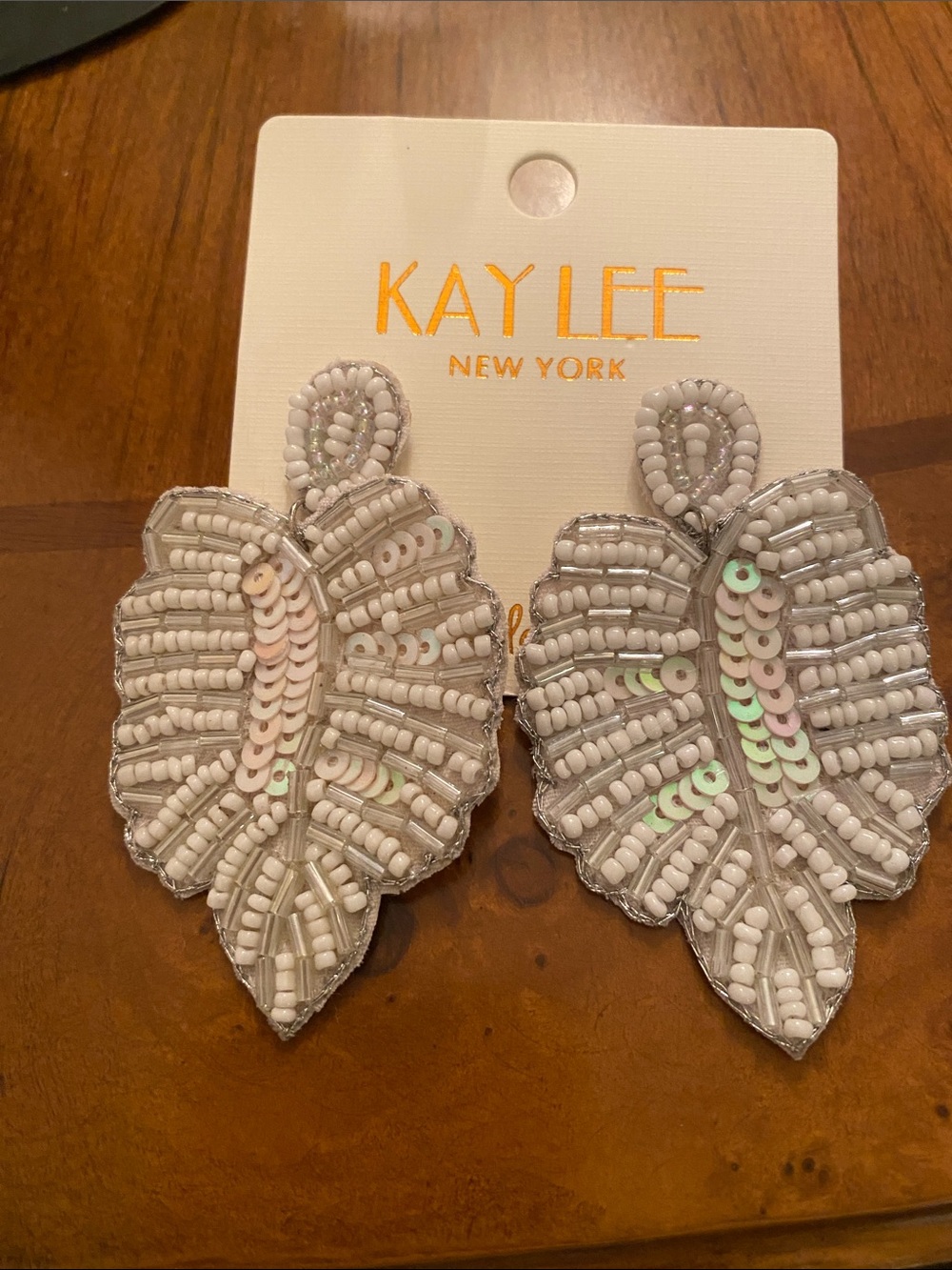 Kaylee New York White Beaded Leaf Earrings